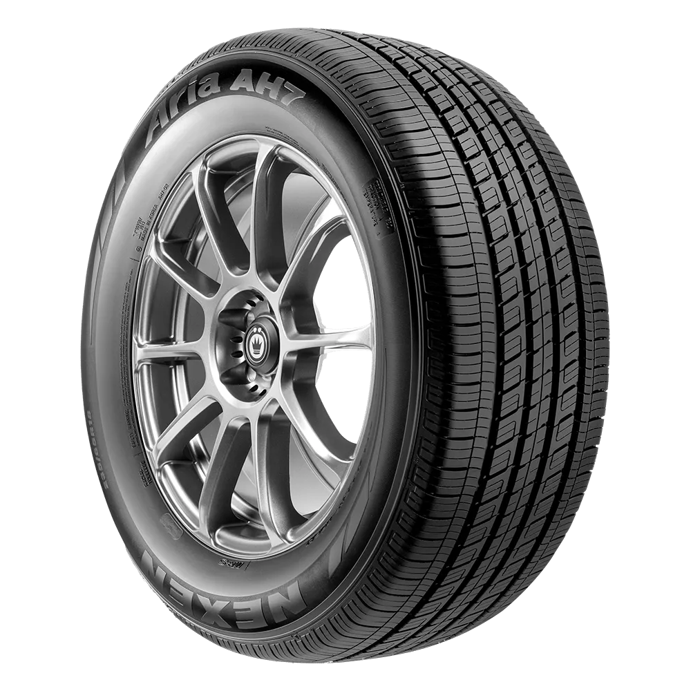 A Nexen Aria AH7 tire mounted on a polished chrome wheel.
