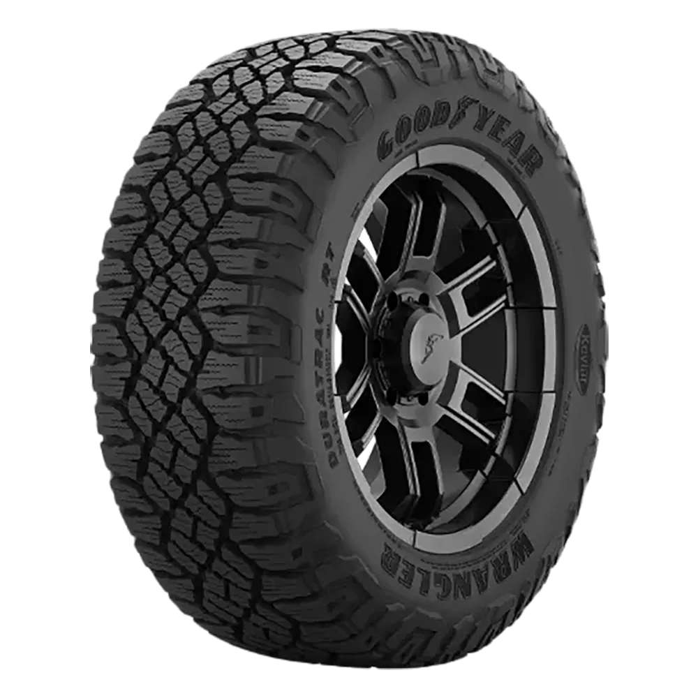 A Goodyear Wrangler tire with a rugged tread pattern and black alloy wheel.