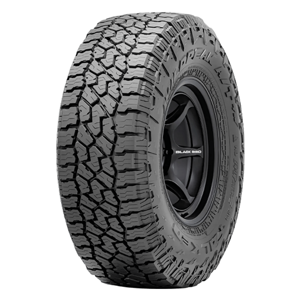 Photo of Falken WildPeak A/T 4W tire mounted on a Black Rhino rim.