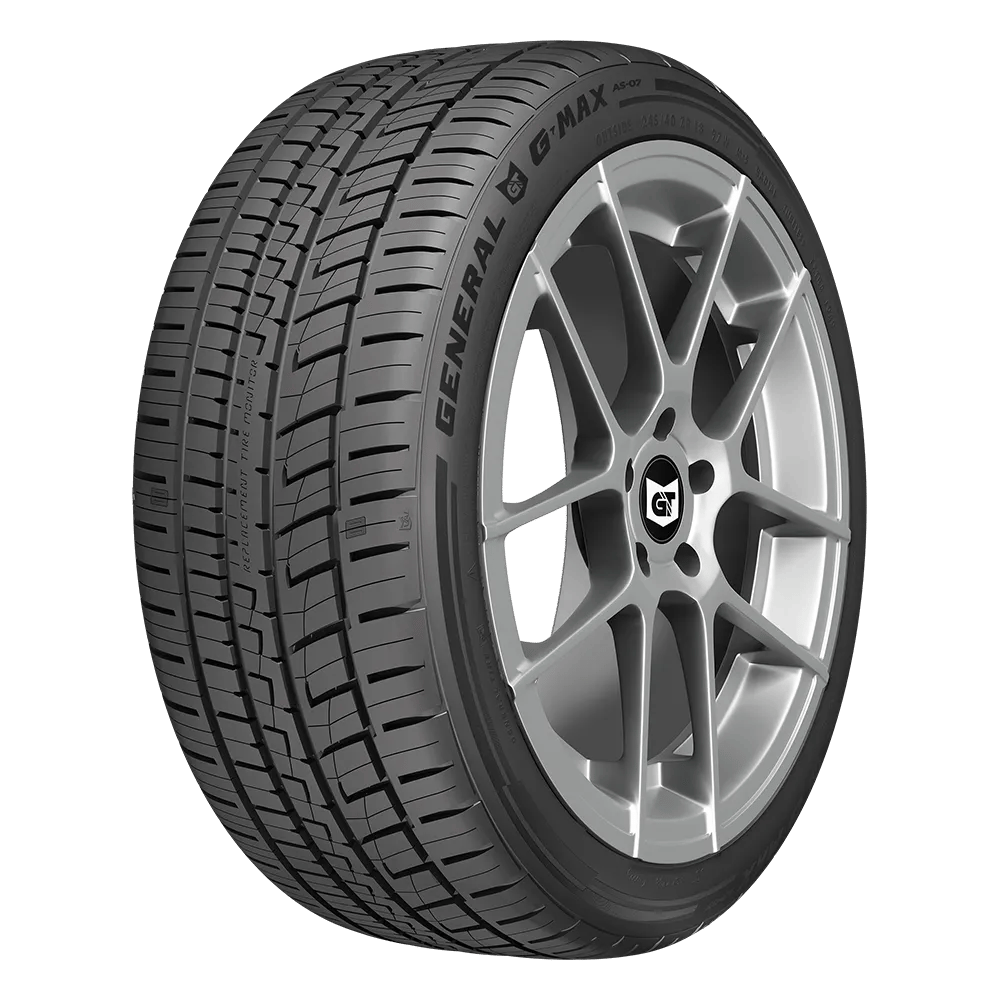 a black general gmax tire mounted on a matte finish aluminum alloy wheel with five split spokes for a ford mustang