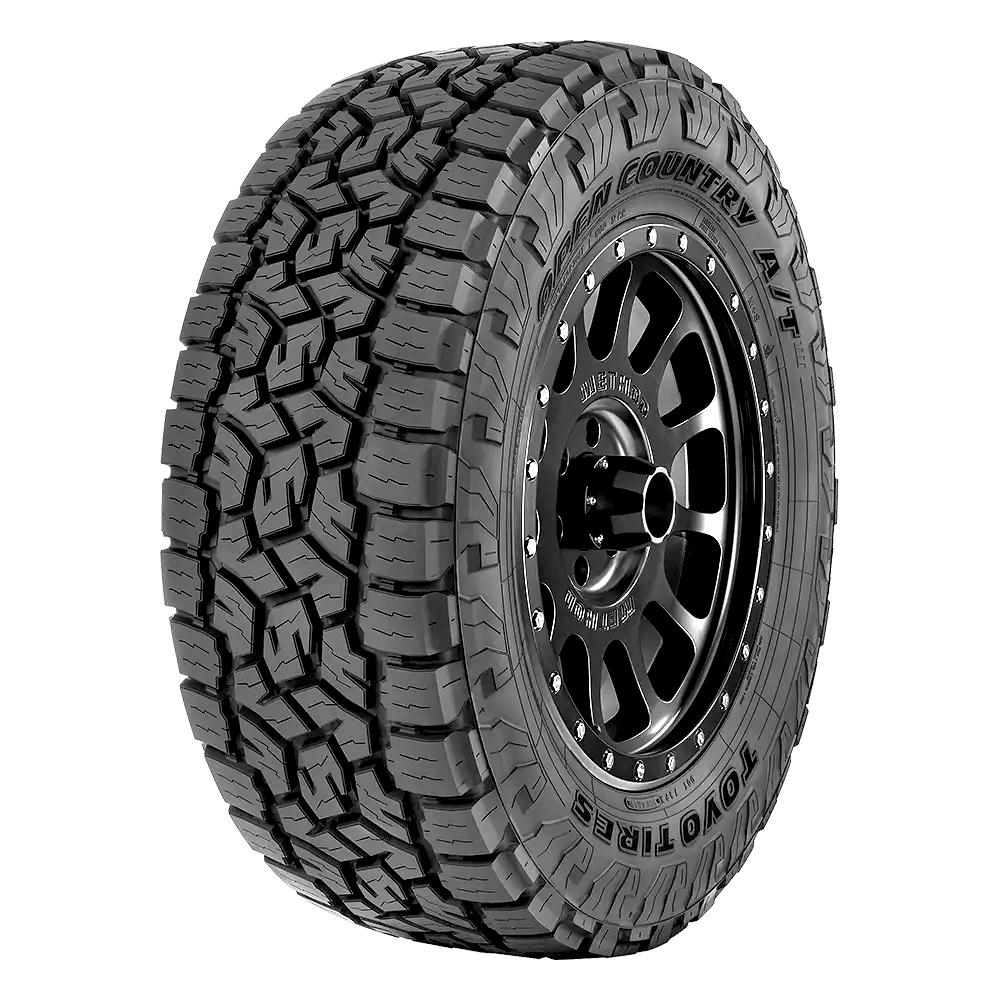 Front side view of a toyo open country at tire with aggressive tread blocks, mounted on a black Method wheel.