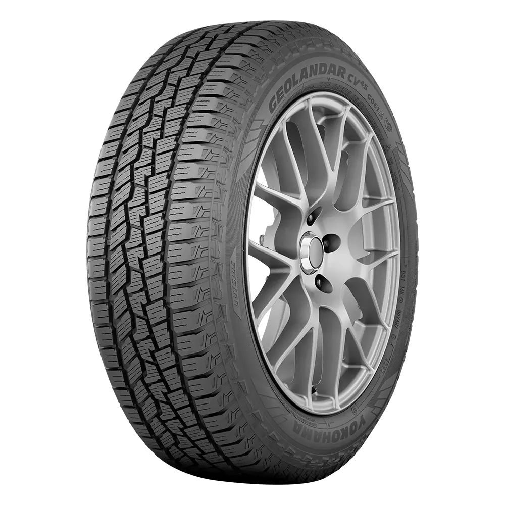 A Yokohama Geolandar CV G058 tire with a stylish alloy wheel, featuring an all-season tread pattern designed for enhanced traction and stability.
