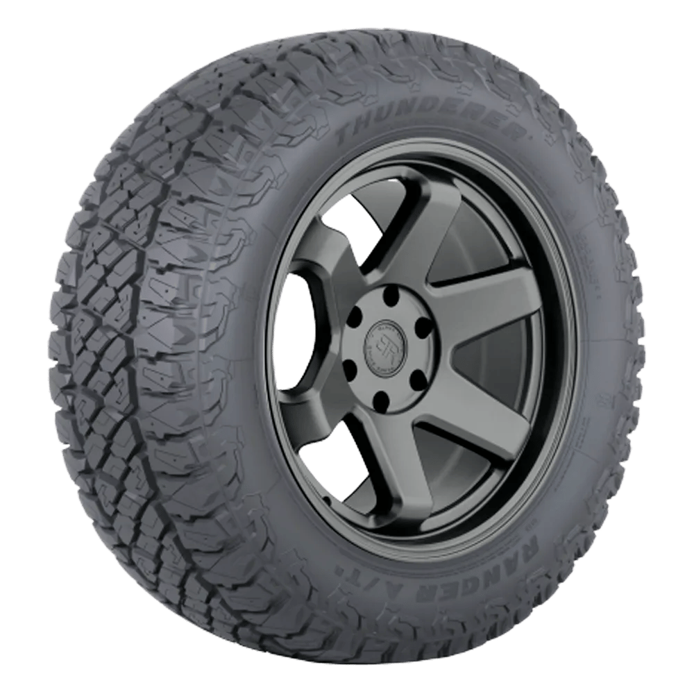 A Thunderer Ranger AT R tire mounted on a six-spoke black matte finish rim with six lugs.