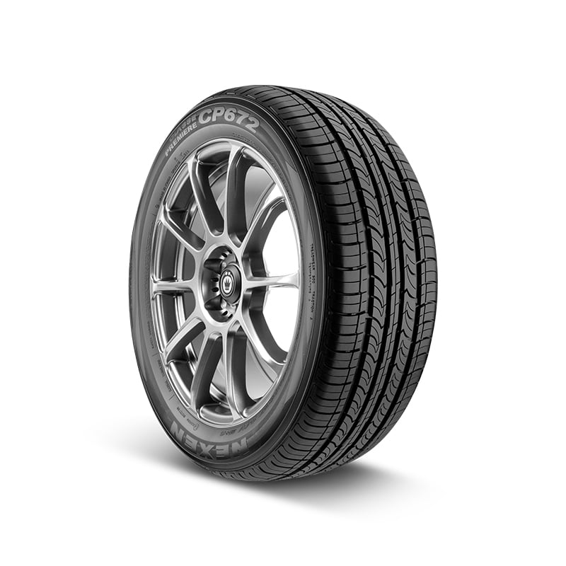A Nexen CP672 tire with an alloy wheel, showing detailed tread patterns and shiny metal spokes.