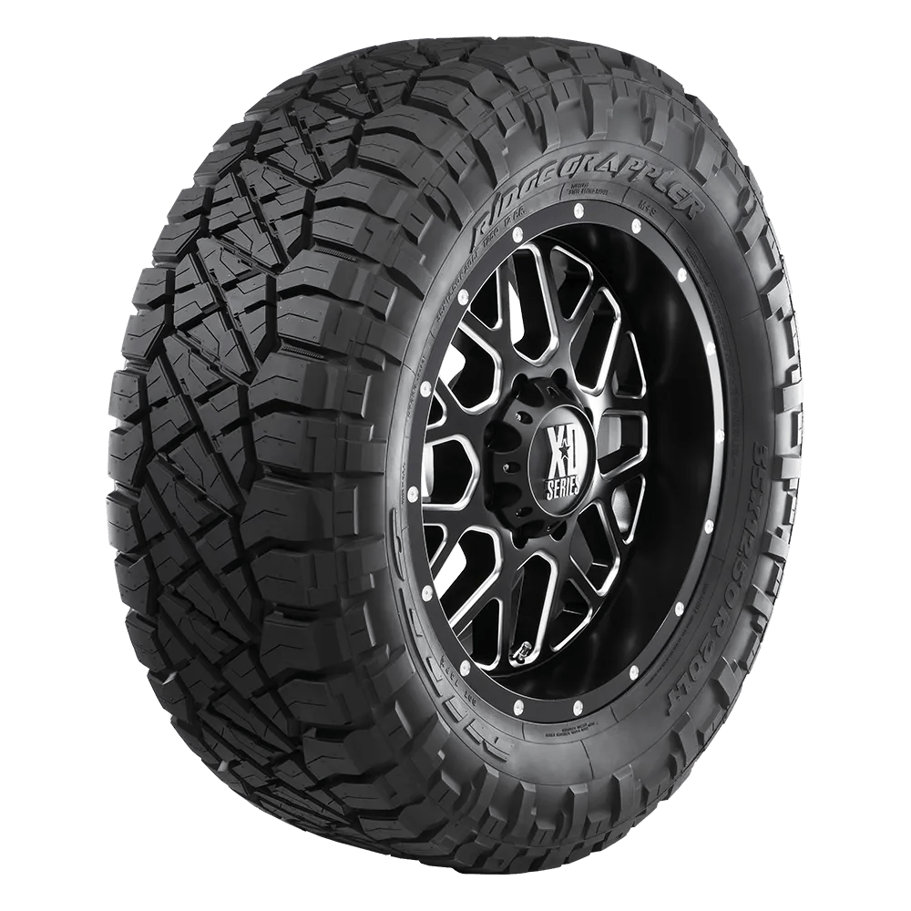 Right front view of the Nitto Road Grappler mounted on a black and chrome finished rim by XD Series.