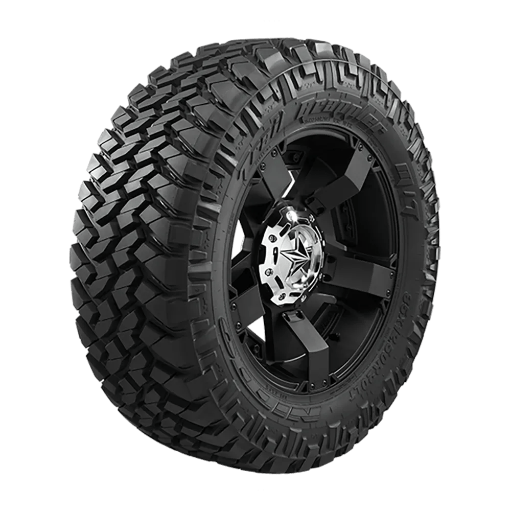 front right facing view of a nitto trail grappler mud terrain tire on a black and chrome rim.