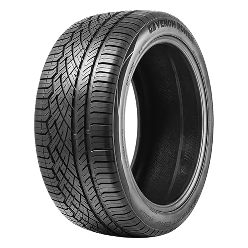 A black Venom Power tire with detailed tread pattern and sidewall logo.
