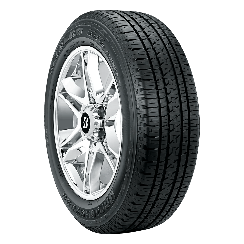 Left front-side view of a Bridgestone Alenza HL dueler tire mounted on a chrome wheel with a Bridgestone logo. 