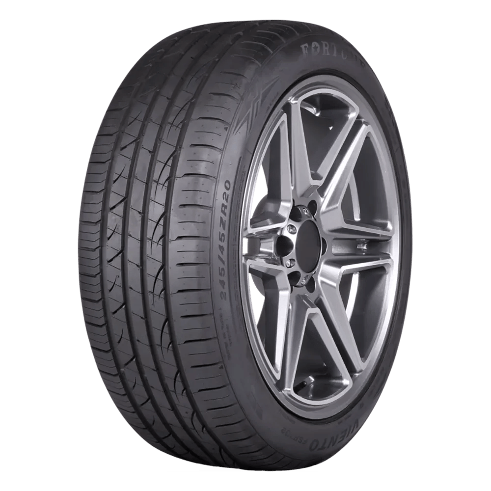 a black fortune viento tire size 245/45z420 mounted on a six-split-spoke wheel that's polished chrome for a ford mustang