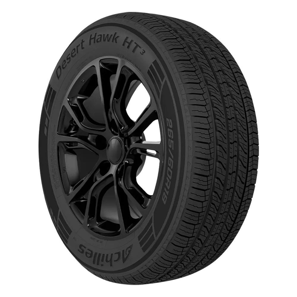 A black tire with the label 'Desert Hawk HT3' on the sidewall, mounted on a sleek black alloy wheel with a modern design and visible tread patterns.